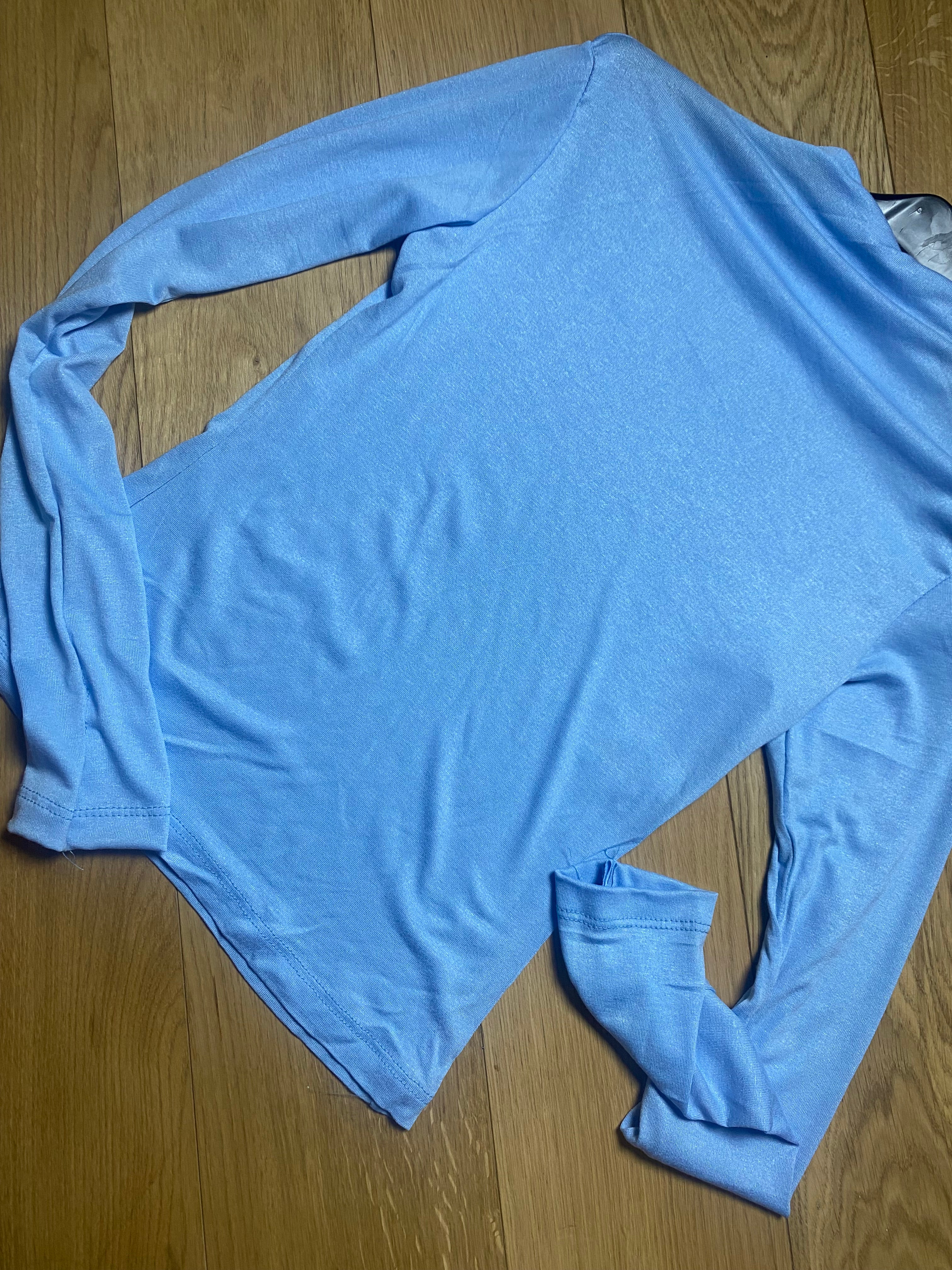 Maglia semi trasparente mezzo collo