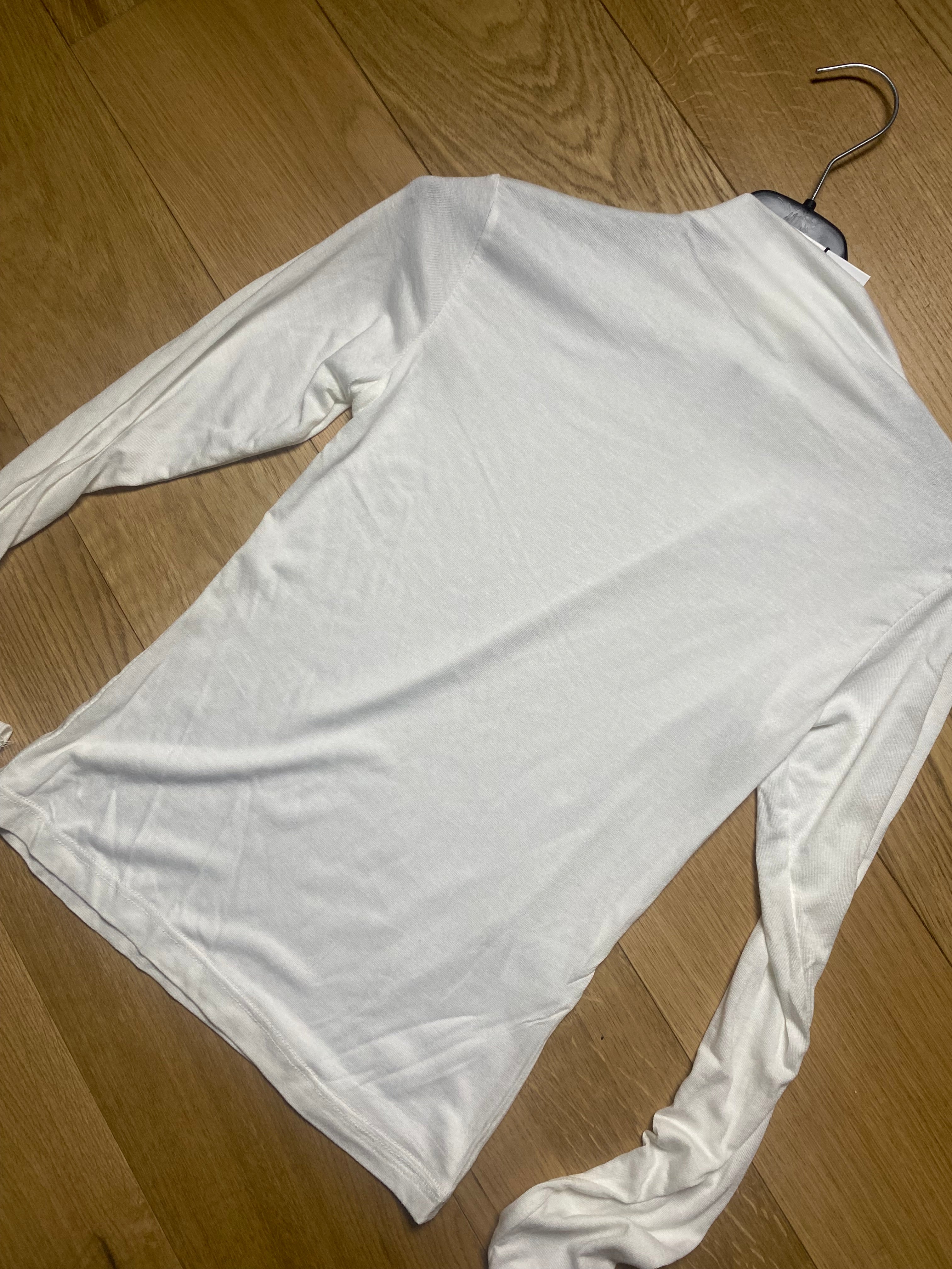 Maglia semi trasparente mezzo collo