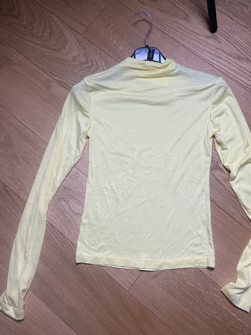 Maglia semi trasparente mezzo collo